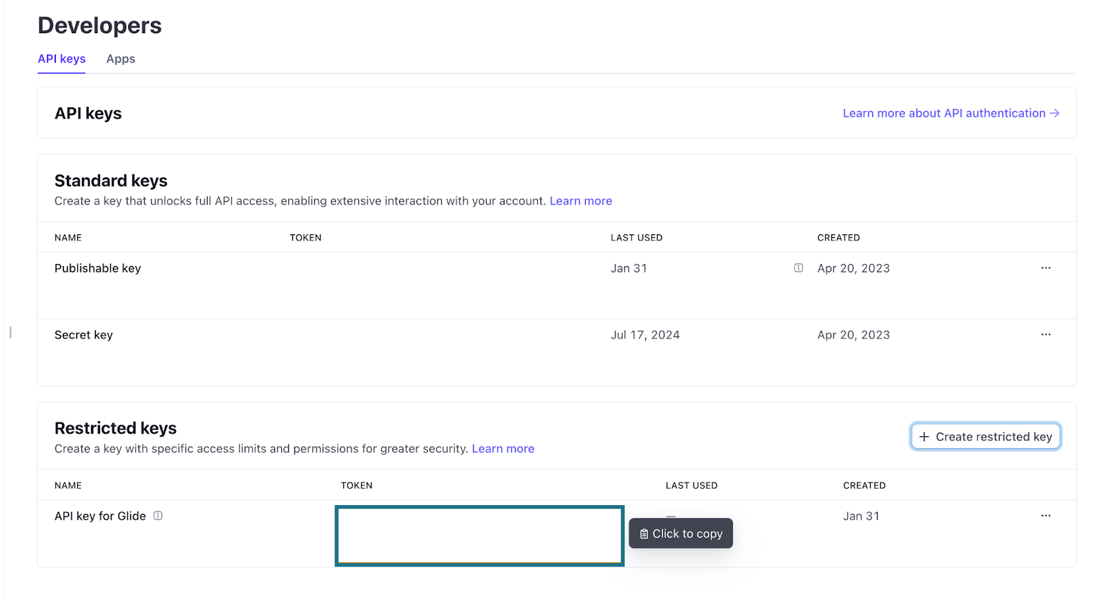 The Stripe Developers Dashboard, highlighting the area where one can copy restricted keys.