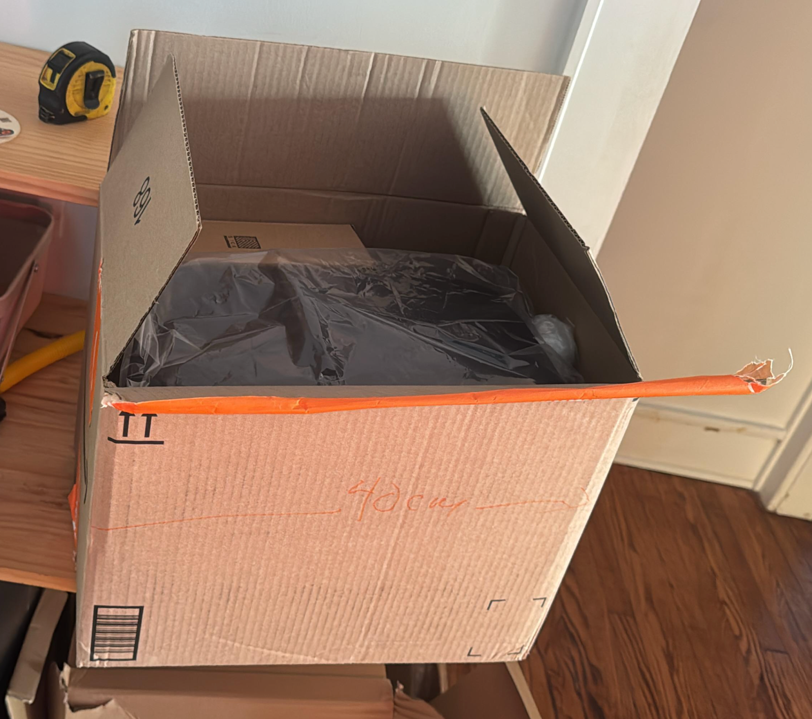 Image of cardboard box for shipping climbing equipment